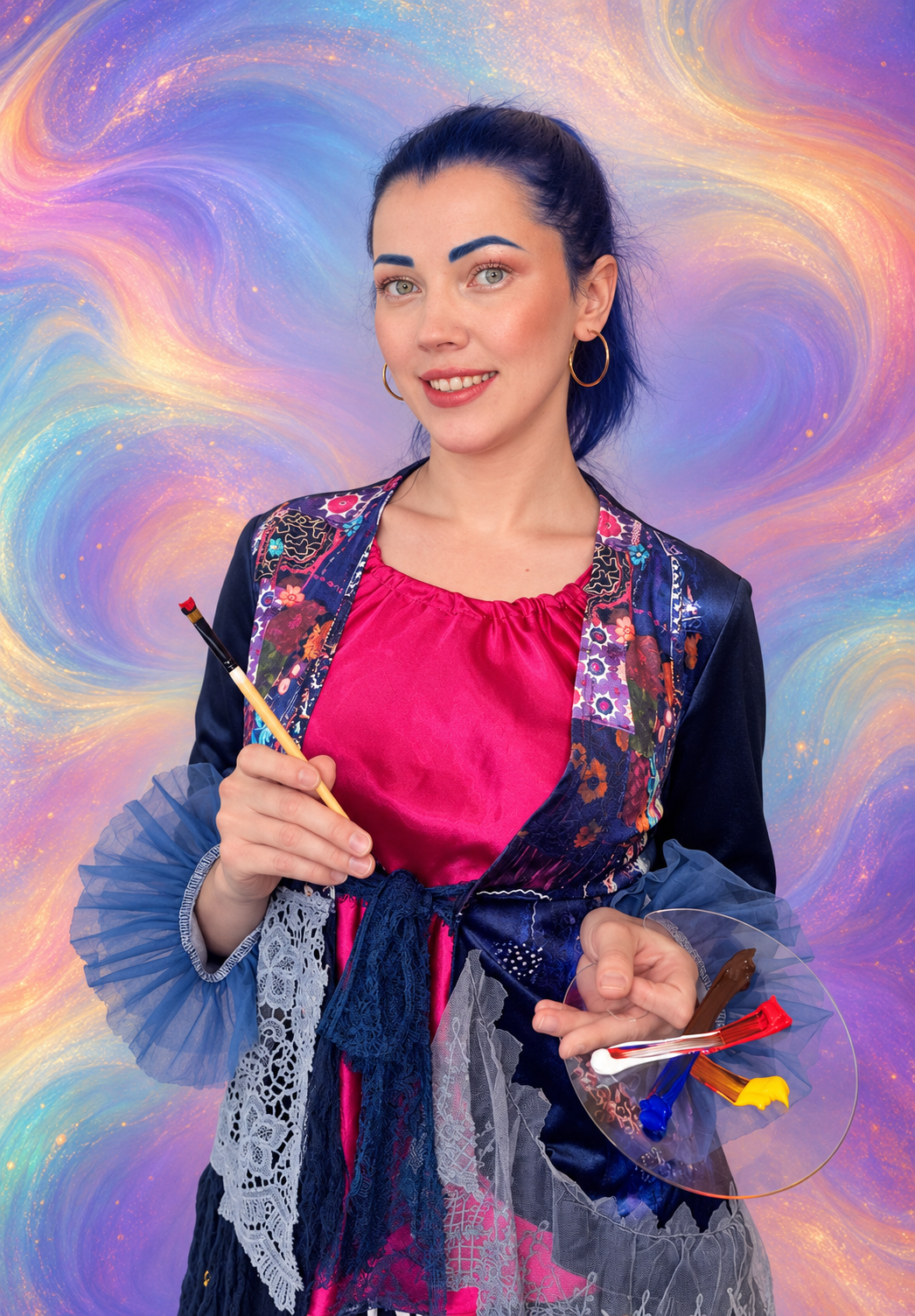 Dana holding a paintbrush and palette
